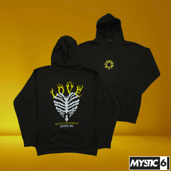 Mystic Six black hoodie featuring a ribcage skeleton design with the word "LOVE" in yellow and white, and the text "Beyond the Surface" underneath.