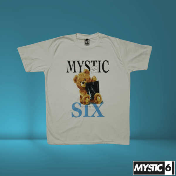 Mystic Six white T-shirt featuring a graphic of a teddy bear holding an X-ray sheet